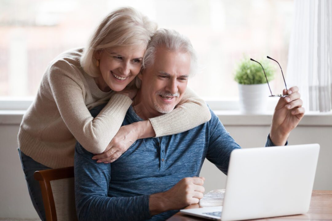 Couple reviewing Ohio Medicaid plan options including AmeriHealth Caritas Ohio