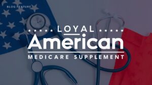 A professional and clean blog feature image containing the text "Loyal American Medicare Supplement" in bold, modern typography. The theme is a combination of medical and patriotic elements, represented by the American flag and stethoscope imagery. The background is a soft gradient of blue and red, symbolizing loyalty and trustworthiness. Overall, the image exudes a sense of reliability and professionalism.