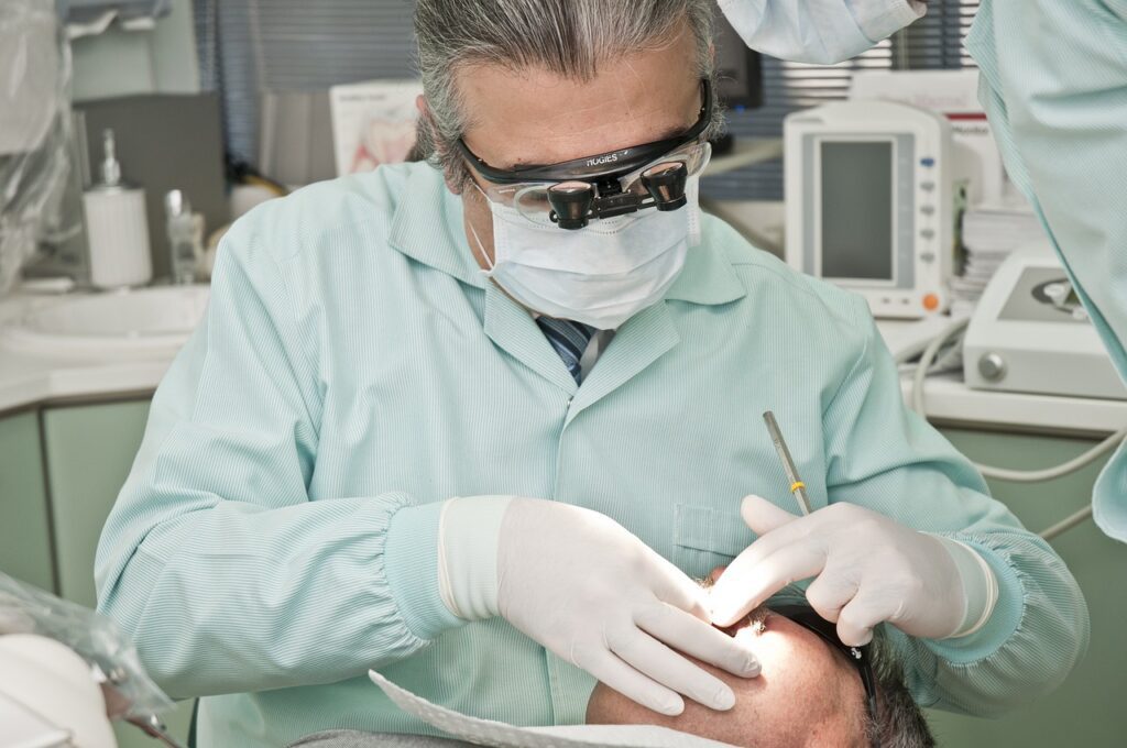 Dentist examining a patient - Medicare Advantage dental coverage